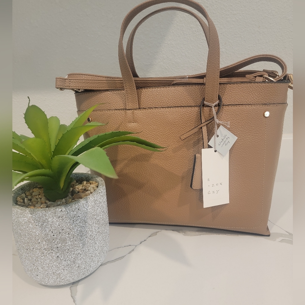 Brown detachable crossbody bag.